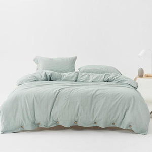 Green Washed Cotton Duvet Cover Set with two pillow covers.