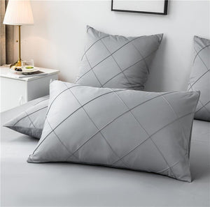 Microfiber made Pillow Covers in gray color.