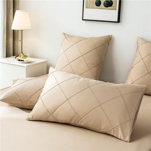 Cream color pillow covers.