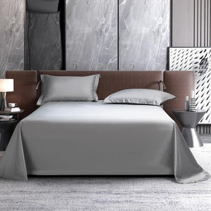 Front view of Juana flat bedding sheets in light gray color.