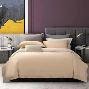 Bed wearing Juana Duvet Cover Set in cream color.